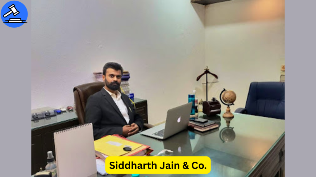 Advocate Siddharth Jain sitting at his office desk in East of Kailash – one of the Best Property Lawyers in Delhi, known for expert real estate legal services.
